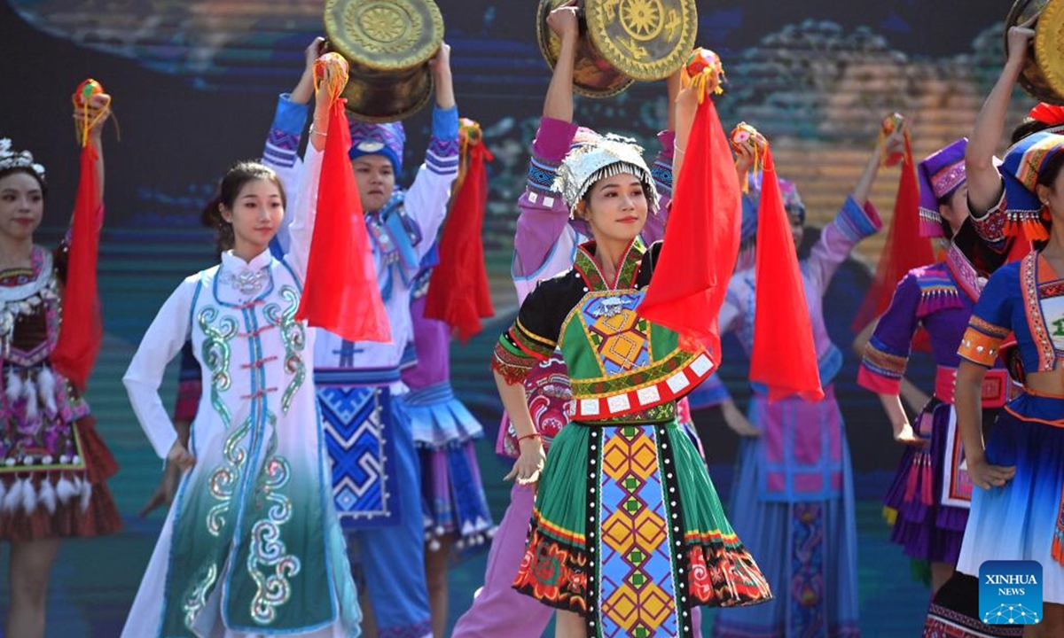 People perform folk songs and dances during a cultural tourism carnival in Wuzhou, south China's Guangxi Zhuang Autonomous Region, Nov. 12, 2024. The 2024 Guangxi cultural tourism carnival kicked off here Tuesday.  (Photo: Xinhua)