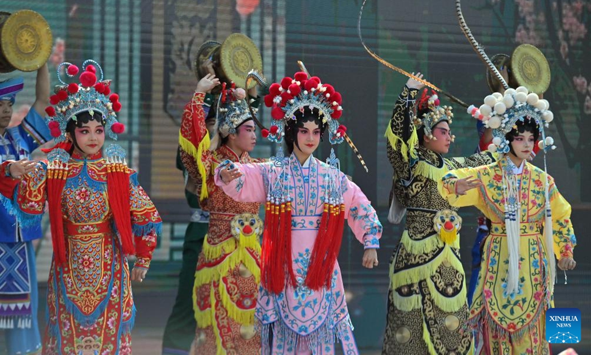 People perform Cantonese Opera during a cultural tourism carnival in Wuzhou, south China's Guangxi Zhuang Autonomous Region, Nov. 12, 2024. The 2024 Guangxi cultural tourism carnival kicked off here Tuesday.  (Photo: Xinhua)