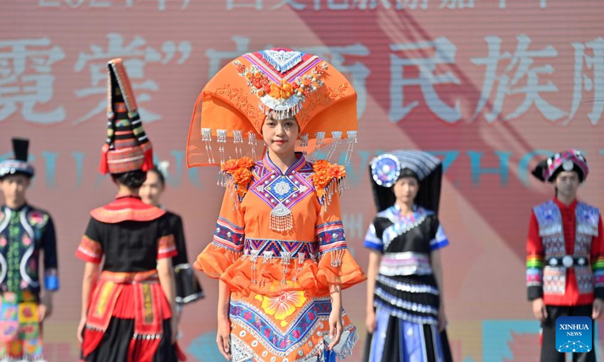 Models present folk costumes during a cultural tourism carnival in Wuzhou, south China's Guangxi Zhuang Autonomous Region, Nov. 12, 2024. The 2024 Guangxi cultural tourism carnival kicked off here Tuesday.   (Photo: Xinhua)