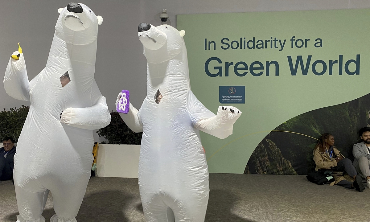  Environmentalists dress as polar bears to draw attention to the consequences of global warming during the COP29 World Climate Conference in Baku, Azerbaijan, on November 14, 2024. The bears' habitat is under threat due to the melting Arctic ice. Photo: VCG