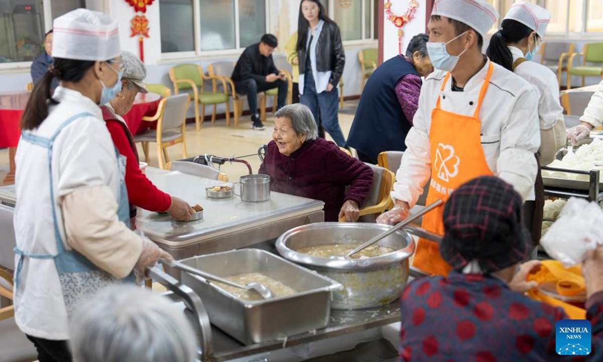 Senior residents have lunch at a residential compound featuring comprehensive elderly services in Rizhao, east China's Shandong Province, Nov. 13, 2024.

The city of Rizhao has in recent years been committed to enhancing elderly care services that integrate medical, fitness, and daily care through at-home and community-based facilities.  (Photo: Xinhua)