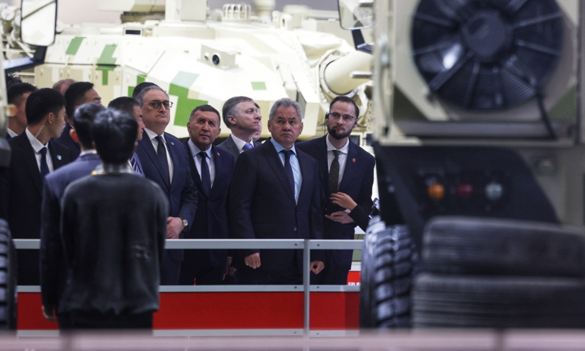 Sergei Shoigu, secretary of the Russian Federation Security Council (second from right), visits Airshow China 2024 on November 14, 2024. Shoigu visited the weaponry hall, where he learned about the development of the Chinese People's Liberation Army (PLA) Navy at the PLA Navy's exhibition booth, the aerospace hall and other exhibition halls. He is in China for the 19th round of the annual China-Russia strategic security consultations. 
Photo: Cui Meng/GT