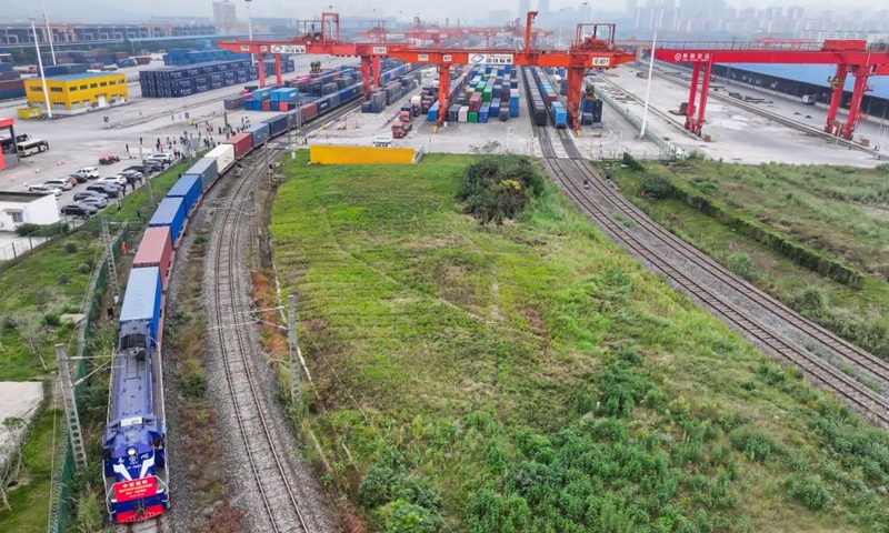 A drone photo taken on Nov. 15, 2024 shows the 100,000th China-Europe freight train, coded X8083, departing from the Tuanjiecun Station in Chongqing, southwest China. (Photo: Xinhua)