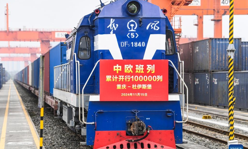 The 100,000th China-Europe freight train, coded X8083, waits for departing at the Tuanjiecun Station in Chongqing, southwest China, Nov. 15, 2024. (Photo: Xinhua)