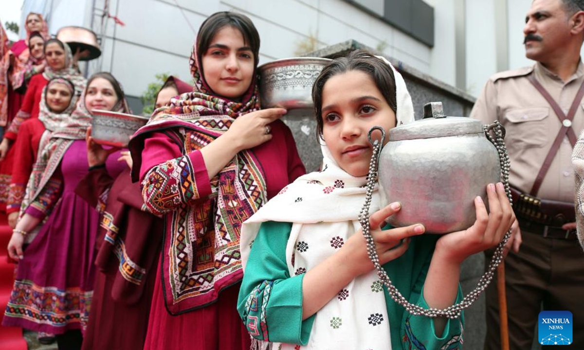 Dressed-up people attend the opening ceremony of the 37th National Handicrafts Exhibition in Tehran, Iran, Nov. 13, 2024. The exhibition opened here Wednesday.  (Xinhua)