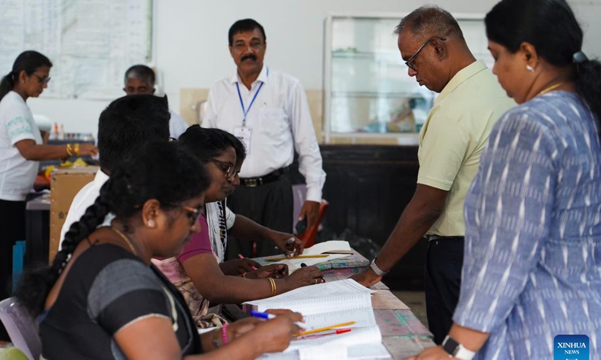 People vote at a polling station in Colombo, Sri Lanka on Nov. 14, 2024. Voting in the Sri Lankan parliamentary election began on Thursday morning at 7:00 a.m. local time after the opening of polling stations across the South Asian country.  (Photo: Xinhua)