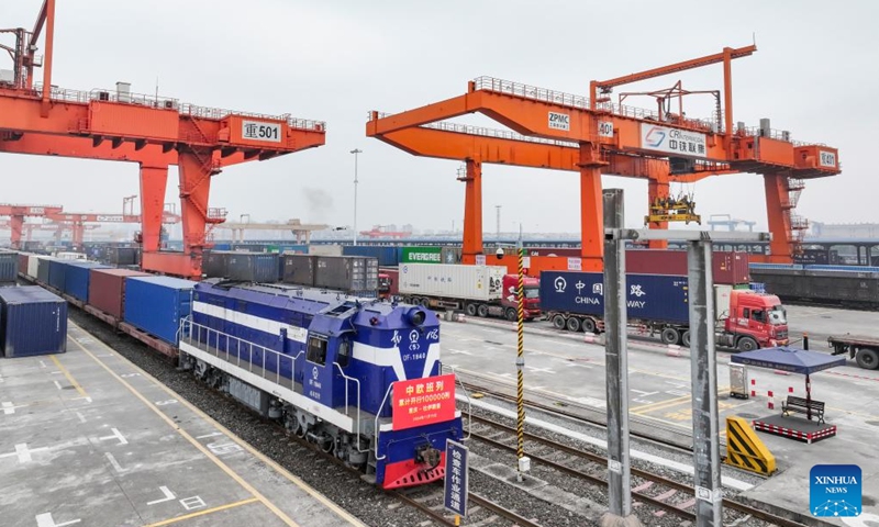 A drone photo taken on Nov. 15, 2024 shows the 100,000th China-Europe freight train, coded X8083, at the Tuanjiecun Station in Chongqing, southwest China. (Photo: Xinhua)