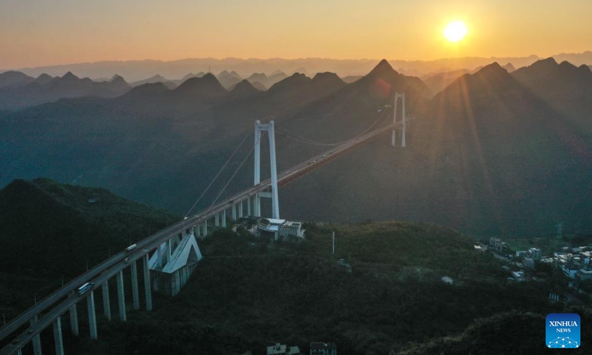 A drone photo taken on Nov. 14, 2024 shows the Baling River bridge at sunrise in southwest China's Guizhou Province. (Photo: Xinhua)