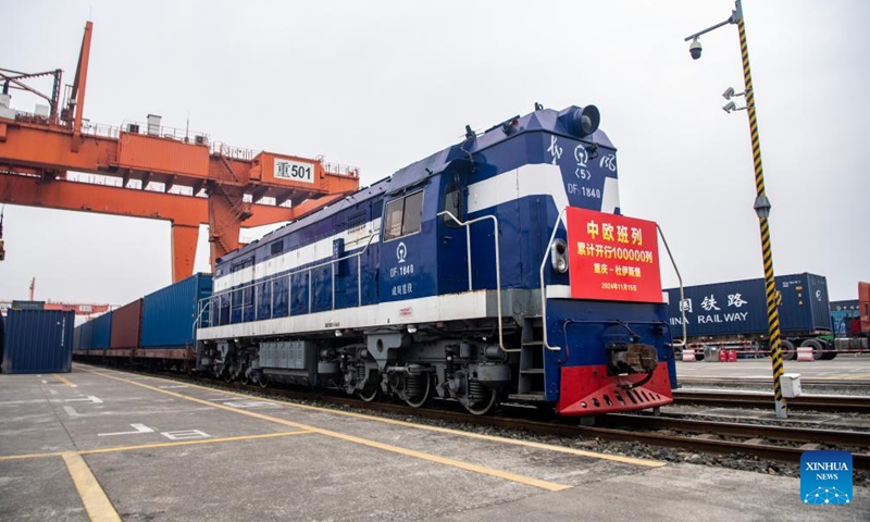 The 100,000th China-Europe freight train, coded X8083, waits for departing at the Tuanjiecun Station in Chongqing, southwest China, Nov. 15, 2024. (Photo: Xinhua)