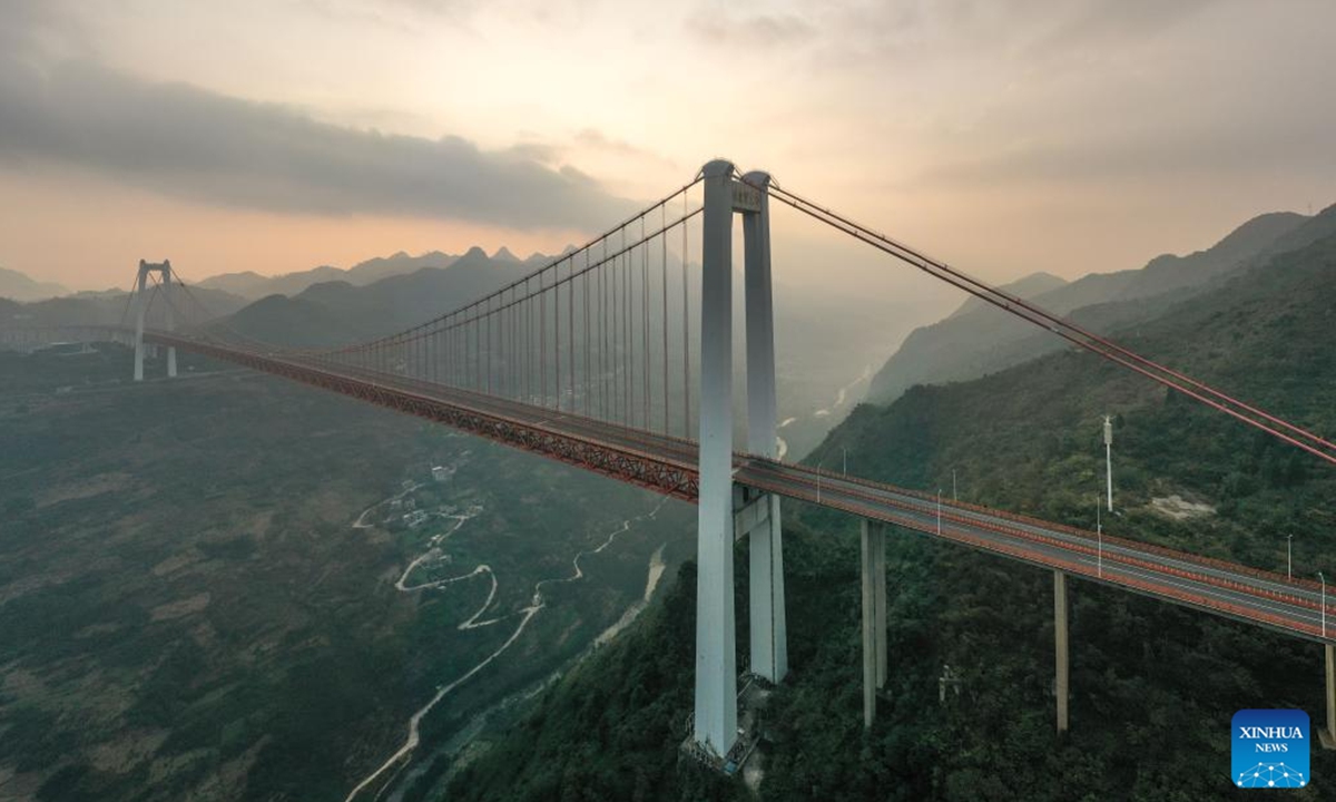 A drone photo taken on Nov. 14, 2024 shows the Baling River bridge at sunrise in southwest China's Guizhou Province. (Photo: Xinhua)