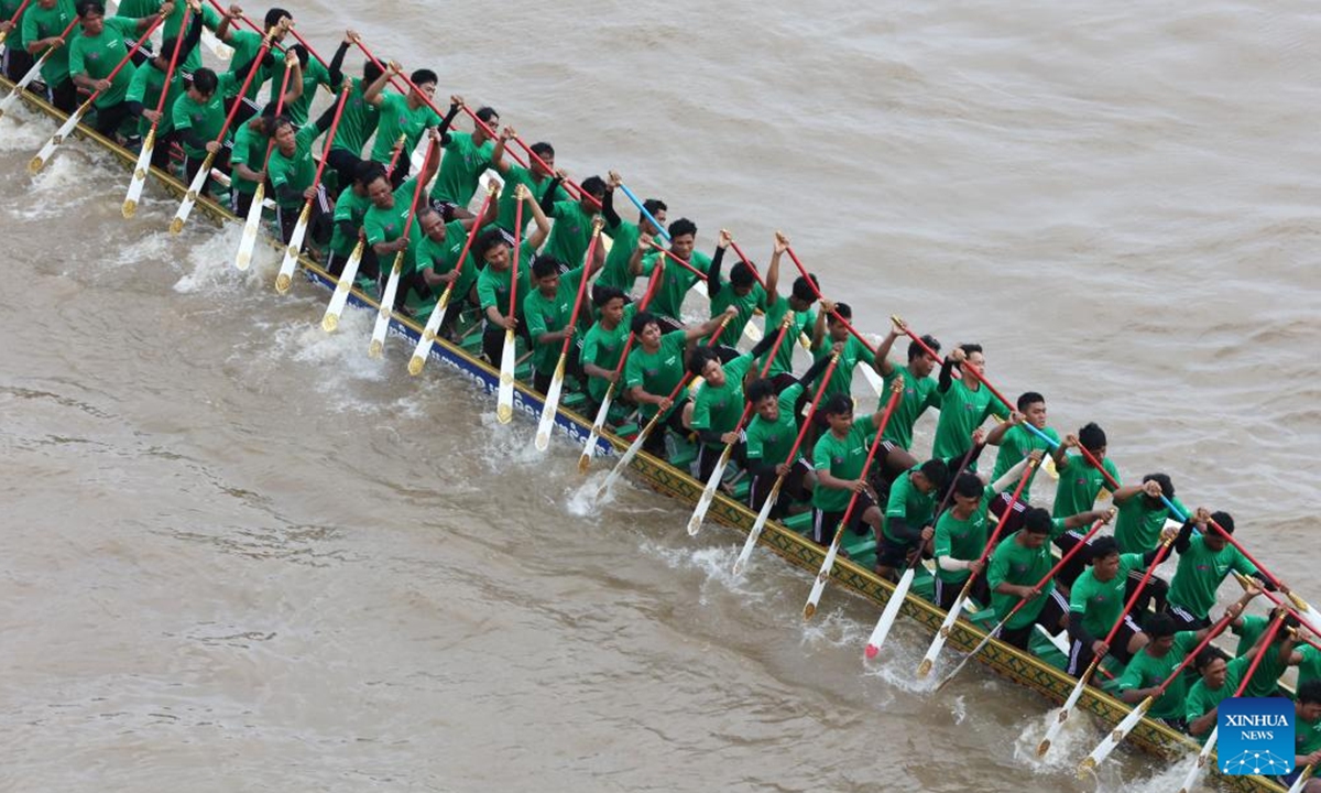 Contestants race their boats during the Water Festival in the Tonle Sap River in Phnom Penh, Cambodia on Nov. 14, 2024. Cambodia began on Thursday to celebrate the annual Water Festival with thrilling dragon boat races, attracting tens of thousands of spectators from across the country. The festival is one of the most joyful festivals in the Southeast Asian country, and boat races are the centerpiece of the three-day festival, which will last till Saturday.  (Photo: Xinhua)