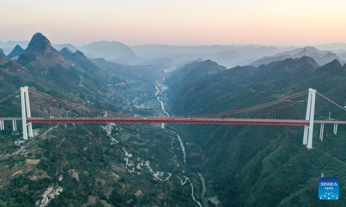 A drone photo taken on Nov. 14, 2024 shows the Baling River bridge at sunrise in southwest China's Guizhou Province. (Photo: Xinhua)