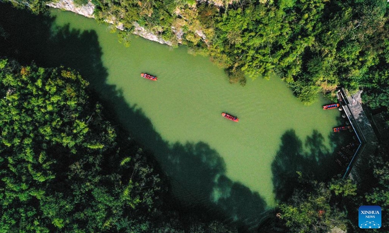 An aerial drone photo shows tourists taking sightseeing boats at Huangguoshu Scenic Area in Anshun City, southwest China's Guizhou Province, Nov. 14, 2024. (Photo: Xinhua)