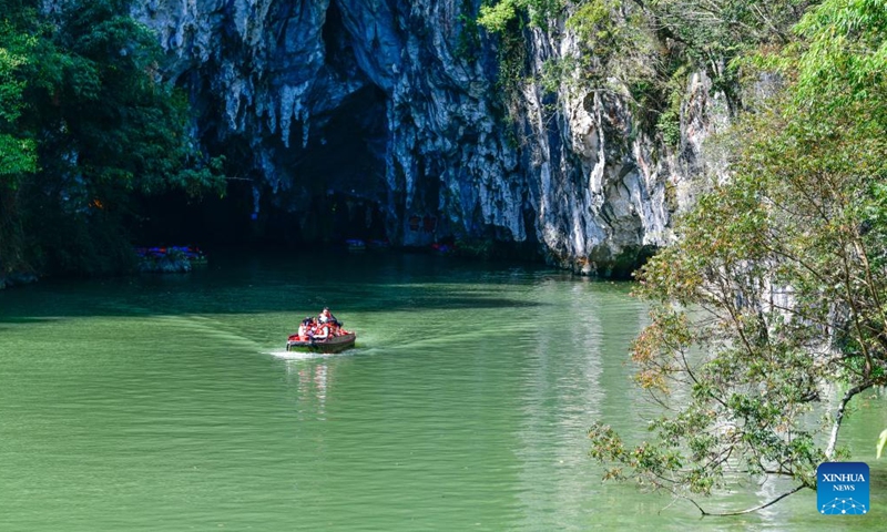 Tourists take a sightseeing boat at Huangguoshu Scenic Area in Anshun City, southwest China's Guizhou Province, Nov. 14, 2024.(Photo: Xinhua)