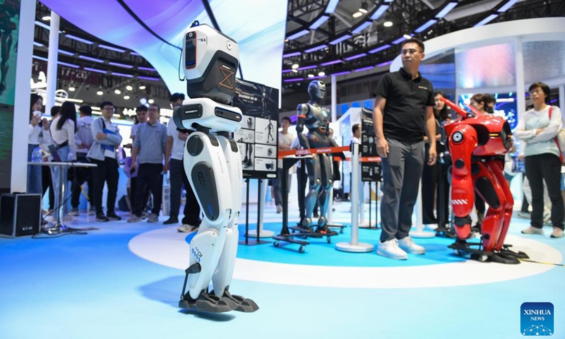 A robot demonstrates its walking ability at the 26th China High-Tech Fair (CHTF) in Shenzhen, south China's Guangdong Province, Nov. 14, 2024. A variety of robots and products of related industries are exhibited at the ongoing 26th CHTF, attracting lots of attention. (Photo: Xinhua)