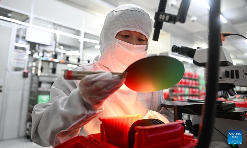 A staff member works at a nanotechnology company at the Suzhou Industrial Park in Suzhou, east China's Jiangsu Province, Nov. 12, 2024. Suzhou Industrial Park has focused on the development of emerging industries such as biomedicine and big health, nanotechnology applications and new materials in recent years. (Photo: Xinhua)