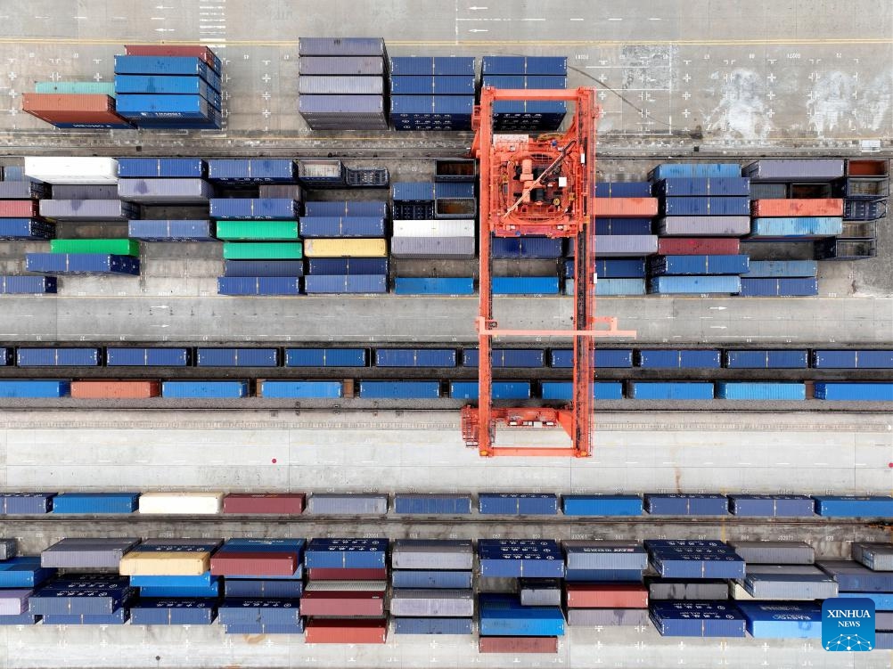 An aerial drone photo shows a view at a railway station of CRIntermodal in Wuhan, central China's Hubei Province, Nov. 16, 2024. The China-Europe freight train (Wuhan) service has 55 international logistics channels reaching 40 countries and regions and 117 cities. It has become an important transportation channel of import and export for domestic foreign trade enterprises. (Xinhua/Xing Guangli)