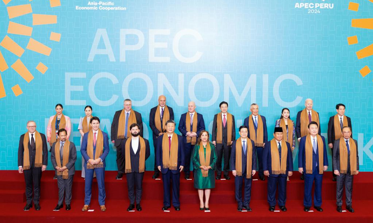 Chinese President Xi Jinping and other leaders and representatives from APEC member economies pose for a group photo in Lima, Peru, Nov. 16, 2024. Xi on Saturday delivered an important speech at the 31st APEC Economic Leaders' Meeting under the title Shouldering Responsibility to Our Times And Jointly Promoting Asia-Pacific Development. (Xinhua/Huang Jingwen)