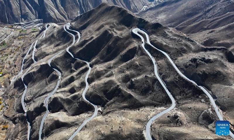 An aerial drone photo taken on Nov. 16, 2024 shows part of Nujiang River zigzag road on the Sichuan-Xizang highway in Baxoi County, southwest China's Xizang Autonomous Region. (Xinhua/Kelsang Namgyai)