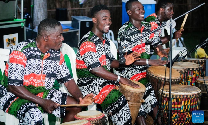 This photo taken on Nov. 15, 2024 shows performers playing percussion instruments in an African culture promotion festival in Abidjan, Cote d'Ivoire. (Photo by Laurent Idibouo/Xinhua)