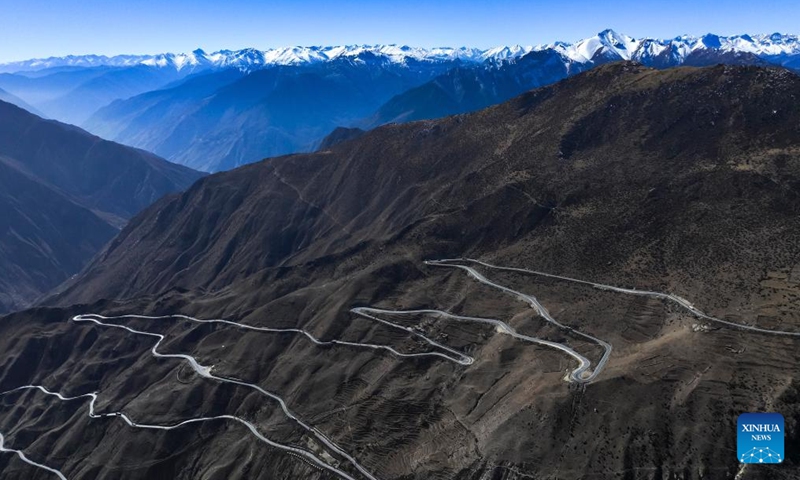 An aerial drone photo taken on Nov. 16, 2024 shows part of Nujiang River zigzag road on the Sichuan-Xizang highway in Baxoi County, southwest China's Xizang Autonomous Region. (Xinhua/Kelsang Namgyai)