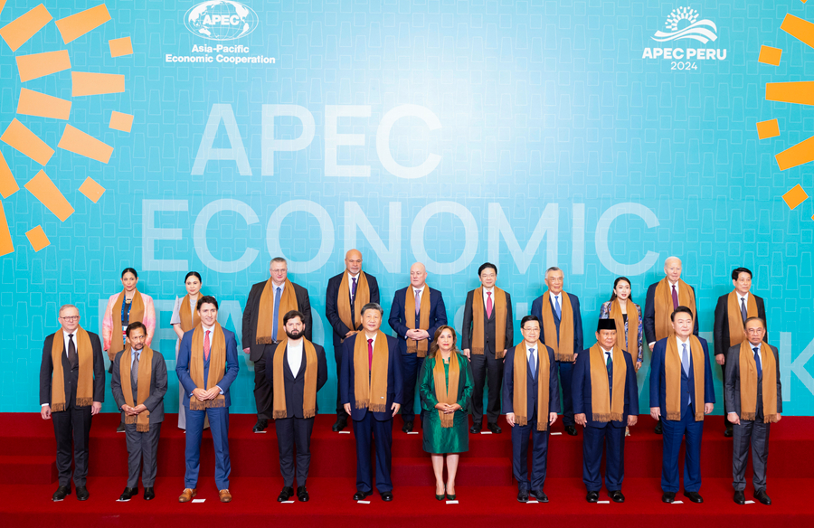 Chinese President Xi Jinping and other leaders and representatives from APEC member economies pose for a group photo in Lima, Peru, Nov. 16, 2024. Xi on Saturday delivered an important speech at the 31st APEC Economic Leaders' Meeting under the title Shouldering Responsibility to Our Times And Jointly Promoting Asia-Pacific Development. (Xinhua/Huang Jingwen)