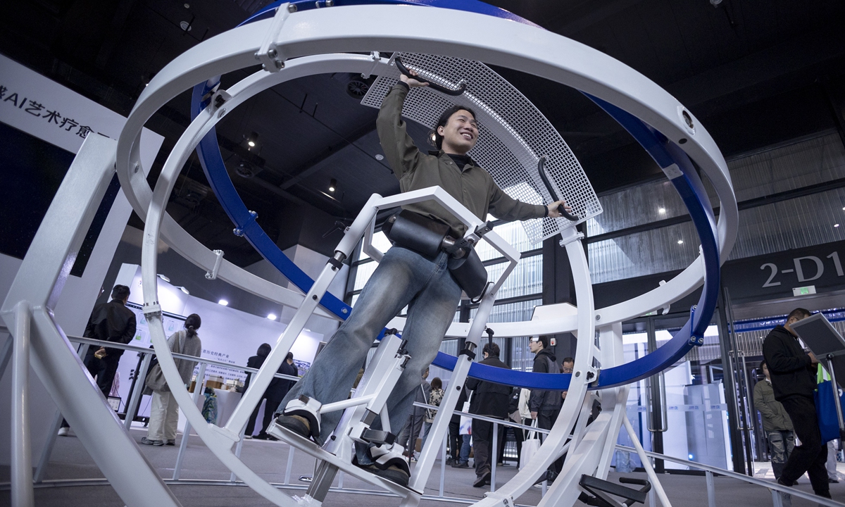 A visitor experiences the human body AI art healing system at the 2024 Light of the Internet Expo in Wuzhen, East China's Zhejiang Province, on November 19, 2024. Photo: VCG  