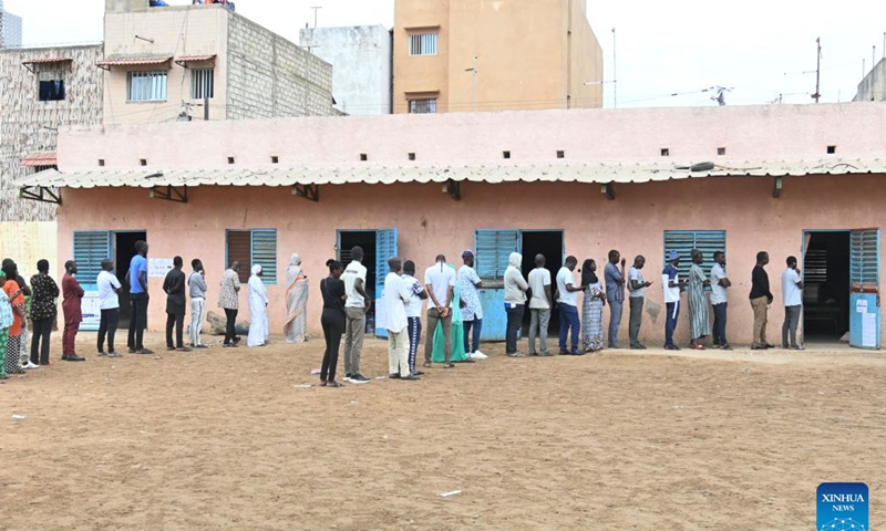  People wait to vote at a polling station in Dakar, Senegal, on Nov. 17, 2024. Polling stations officially opened at 8 a.m., local time, Sunday throughout Senegal and abroad for the legislative elections.(Photo by Papa Demba Gueye/Xinhua)