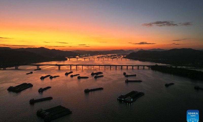 An aerial drone photo taken on Nov. 15, 2024 shows the scenery at sunset near Sizhou Village in Changzhou District of Wuzhou City, south China's Guangxi Zhuang Autonomous Region.(Xinhua/Huang Xiaobang)