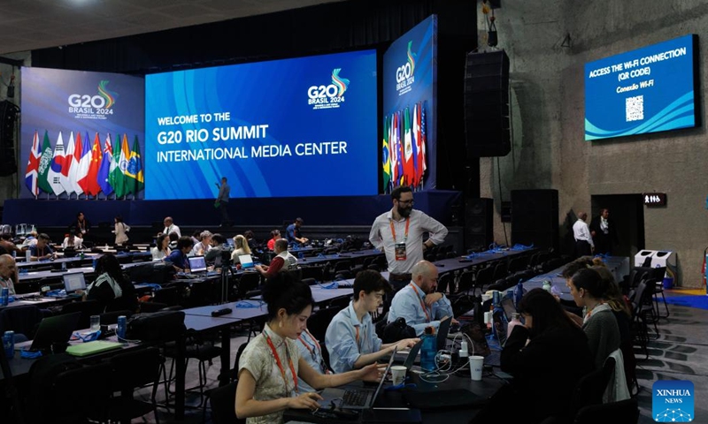 Journalists work at the G20 International Media Center in Rio de Janeiro, Brazil, on Nov. 17, 2024. The International Media Center for the 19th G20 Summit was officially inaugurated on Sunday. (Photo by Claudia Martini/Xinhua)