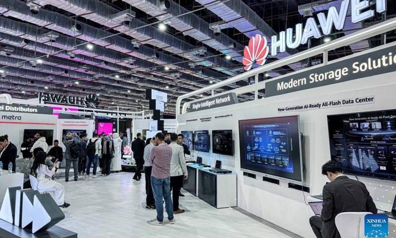 People visit the booth of Huawei at the Cairo ICT expo in Cairo, Egypt, on Nov. 17, 2024.