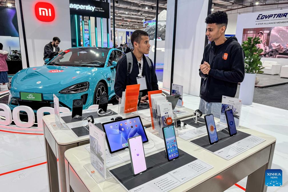 A man visits the booth of Xiaomi smartphone at the Cairo ICT expo in Cairo, Egypt, on Nov. 17, 2024.