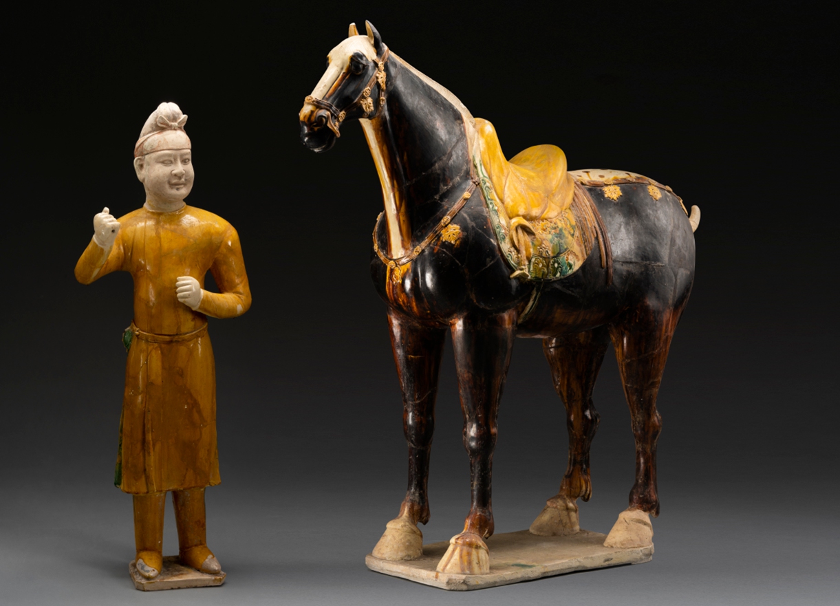 A tri-colored figurine featuring a man leading a horse Photo: Courtesy of the Shaanxi Academy of Archaeology