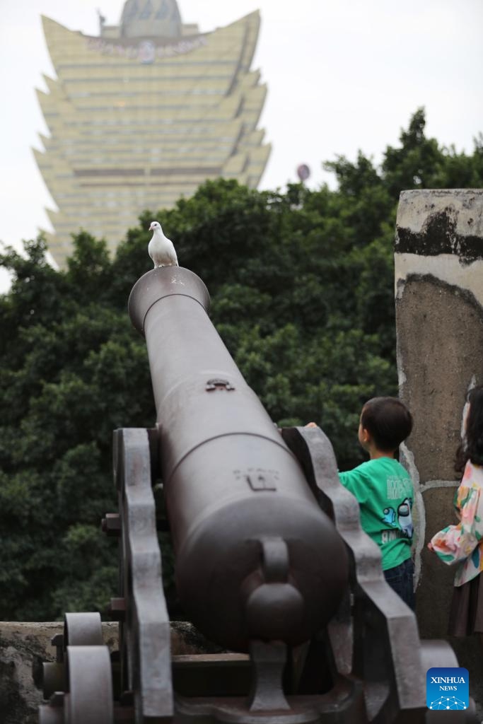 Tourists visit the Monte Fort in south China's Macao, Nov. 18, 2024. The Historic Center of Macao, with its historic street and various historical buildings, has been accepted on the World Heritage List by the United Nations Educational, Scientific and Cultural Organization (UNESCO) in 2005. (Photo: Xinhua)