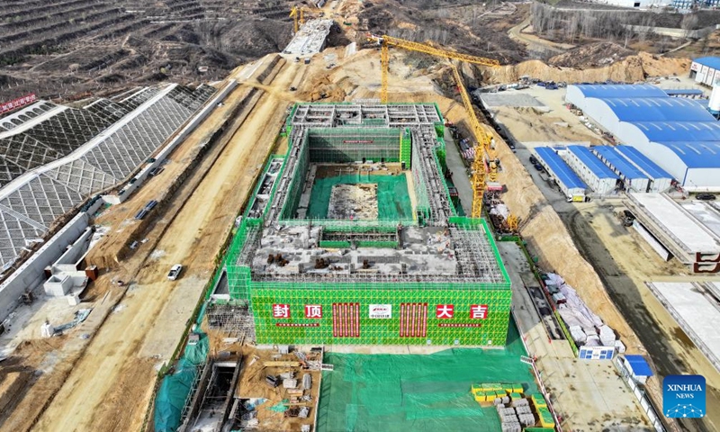 An aerial drone photo taken on Nov. 18, 2024 shows the construction site of Fuping Railway Station of the Xiong'an-Xinzhou High-speed Railway in north China's Hebei Province. The construction of the main structure of Fuping Railway Station was capped on Monday, which is now followed by steel structure installation. (Photo: Xinhua)