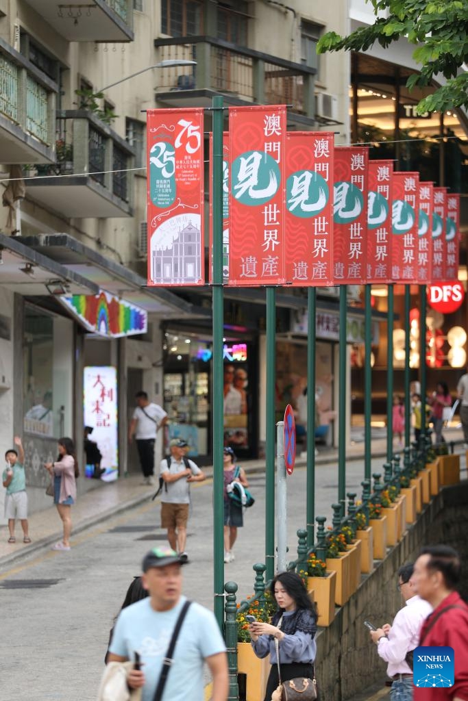 Tourists visit the Senado Square in south China's Macao, Nov. 18, 2024. The Historic Center of Macao, with its historic street and various historical buildings, has been accepted on the World Heritage List by the United Nations Educational, Scientific and Cultural Organization (UNESCO) in 2005. (Photo: Xinhua)