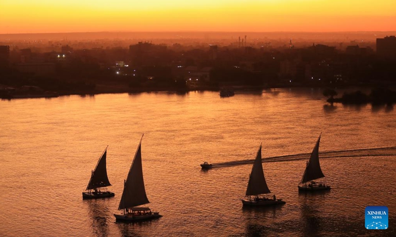 Boats sail on the Nile River at sunset in Cairo, Egypt, on Nov. 18, 2024. (Photo: Xinhua)