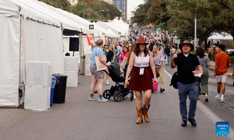 People visit the Texas Book Festival in Austin, Texas, the United States, Nov. 16, 2024. (Photo: Xinhua)