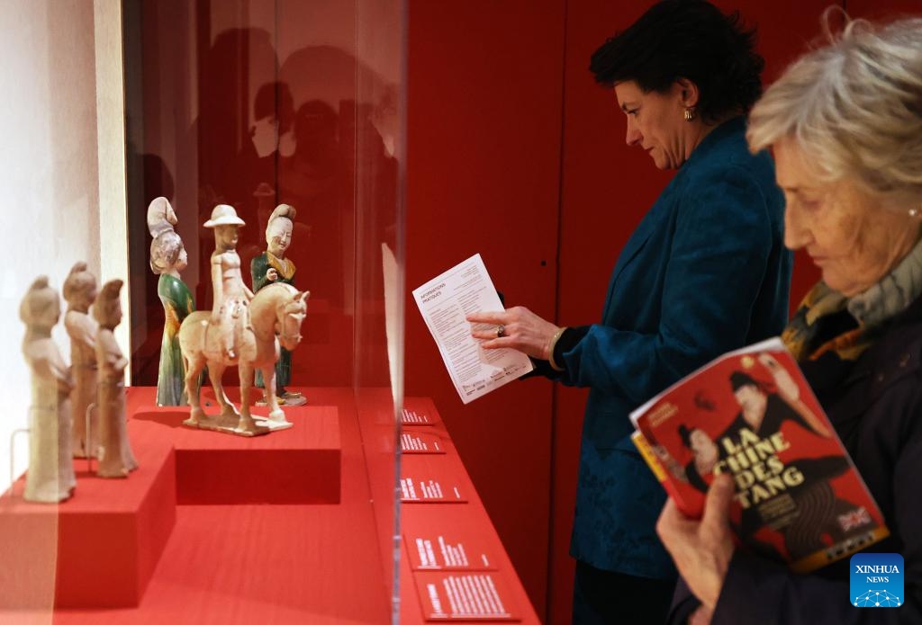 People visit an exhibition titled Tang China -- A Cosmopolitan Dynasty (7th-10th Century) at the Guimet National Museum of Asian Arts in Paris, France, Nov. 18, 2024. The exhibition was inaugurated Monday at France's Guimet National Museum of Asian Arts. The exhibition, directed by China's National Cultural Heritage Administration and the French Ministry of Culture, showcases over 200 pieces or sets of exquisite artifacts from 32 cultural and museum institutions in 10 provincial-level regions and cities in China. (Photo: Xinhua)