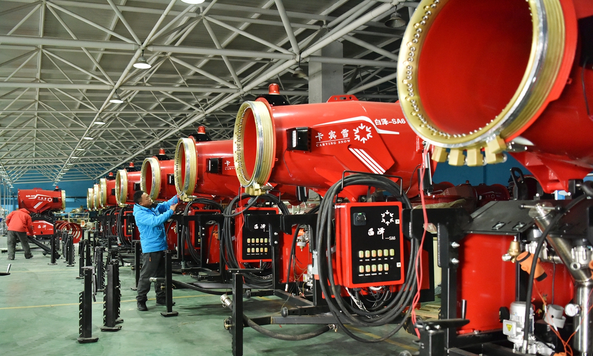 Winter economy heats up  
Employees in an ice and snow park in Zhangjiakou, North China's Hebei Province, assemble snow-making machines on Novermber 20, 2024. During the 2023-24 season, China's ice and snow tourism grew 38 percent year-on-year in terms of visitor numbers and 50 percent in revenue, according to the tourism authority. Photo: VCG