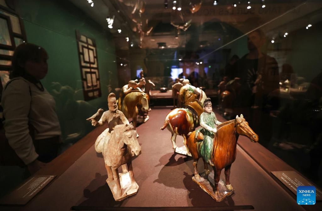 People visit an exhibition titled Tang China -- A Cosmopolitan Dynasty (7th-10th Century) at the Guimet National Museum of Asian Arts in Paris, France, Nov. 18, 2024. The exhibition was inaugurated Monday at France's Guimet National Museum of Asian Arts. The exhibition, directed by China's National Cultural Heritage Administration and the French Ministry of Culture, showcases over 200 pieces or sets of exquisite artifacts from 32 cultural and museum institutions in 10 provincial-level regions and cities in China. (Photo: Xinhua)