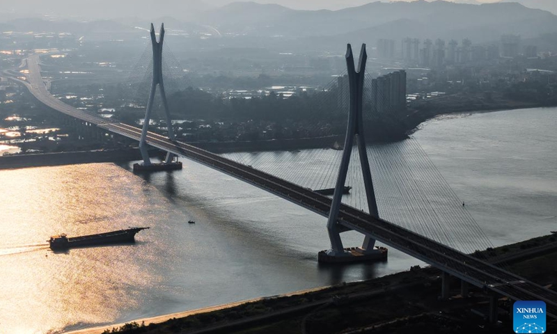 An aerial drone photo taken on Nov. 21 2024 shows a view of the Fulong Xijiang super major bridge in Foshan, south China's Guangdong Province. (Xinhua/Liu Dawei)