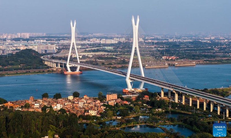 An aerial drone photo taken on Nov. 21 2024 shows a view of the Fulong Xijiang super major bridge in Foshan, south China's Guangdong Province. (Xinhua/Liu Dawei)