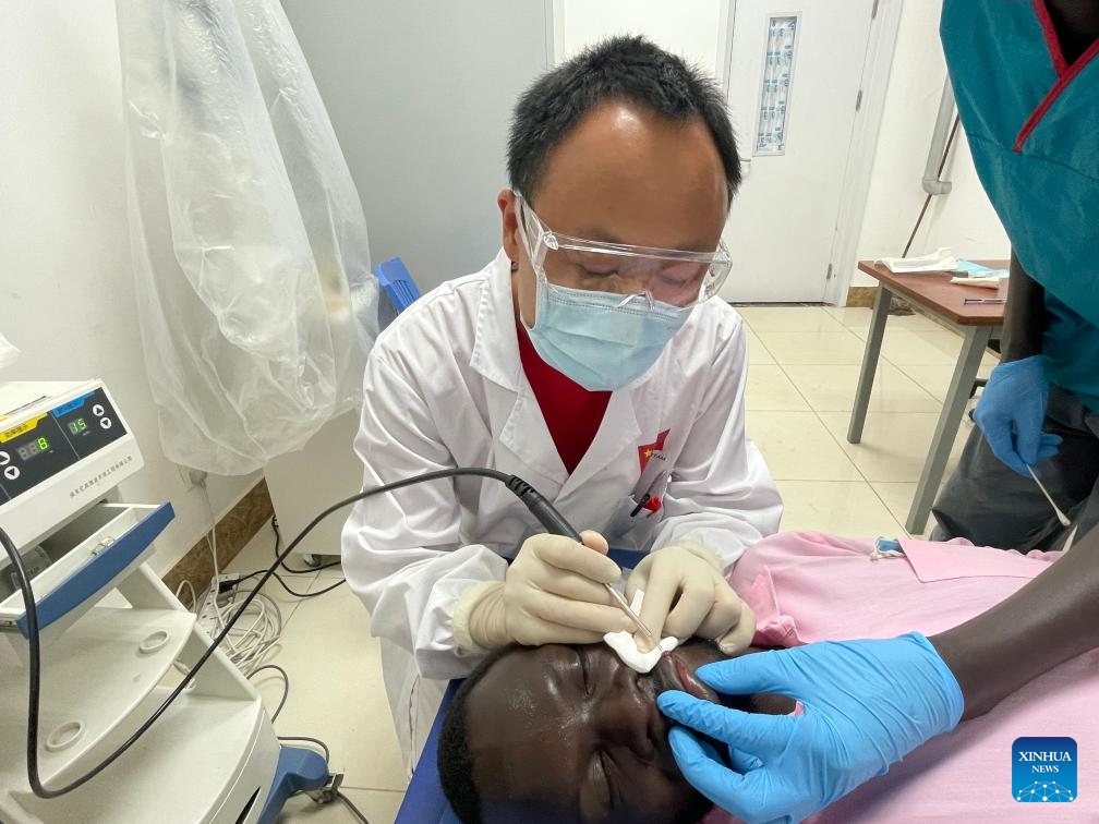 Chinese dermatologist Zheng Jianfeng operates on a South Sudanese patient at the Juba Teaching Hospital in Juba, South Sudan, on Nov. 8, 2024. (Photo by Denis Elamu/Xinhua)