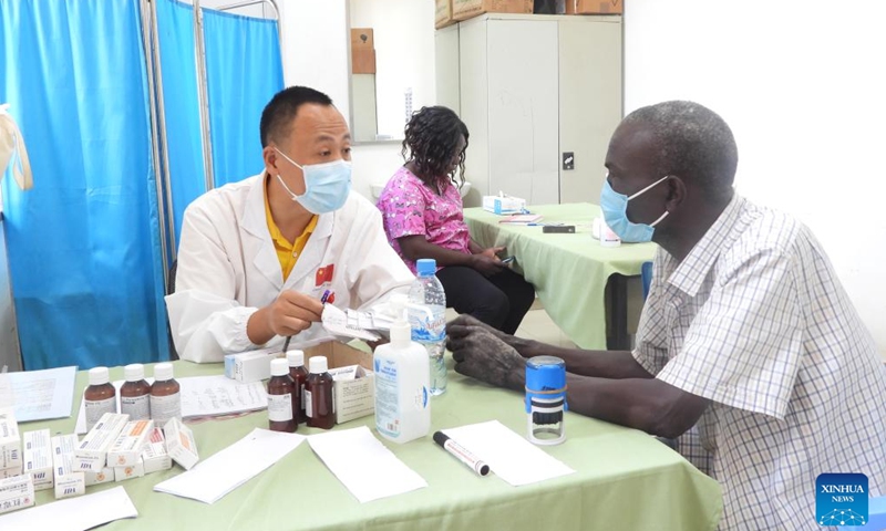 Chinese dermatologist Zheng Jianfeng meets a South Sudanese patient at the Juba Teaching Hospital in Juba, South Sudan, on Nov. 19, 2024. (Photo by Denis Elamu/Xinhua)