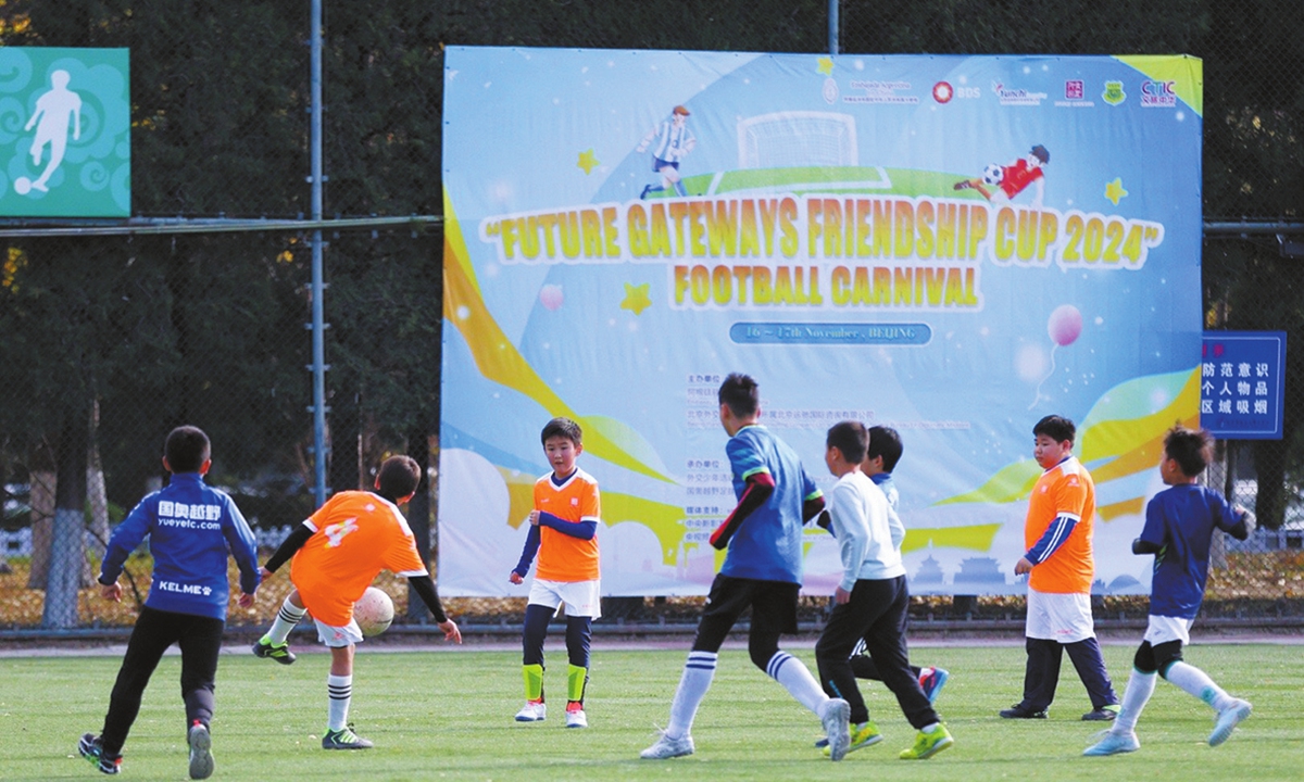 Children soccer players in the middle of a match at the National Olympic Sports Center in Beijing Photo: Courtesy of The Embassy of Argentina in China 