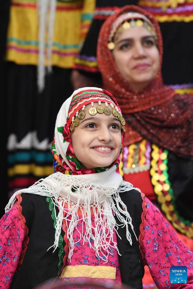 A girl dressed in traditional clothes is pictured in Rasht, Iran, Nov. 19, 2024. (Xinhua/Shadati)