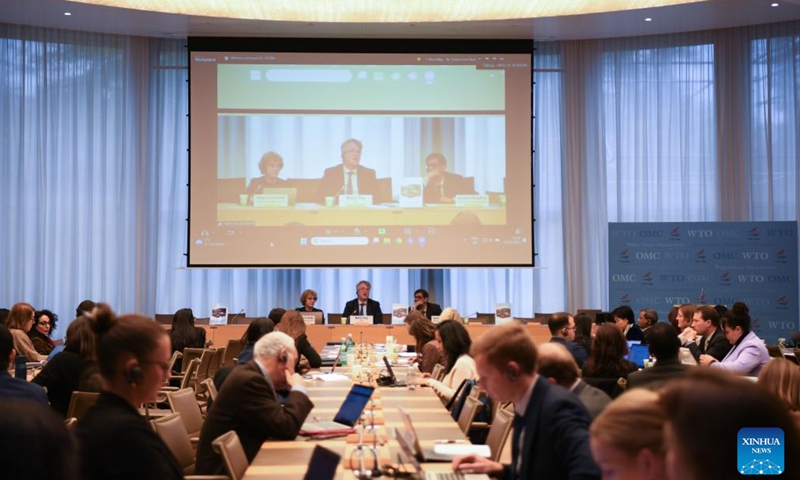 People attend a conference at the World Trade Organization (WTO) headquarters in Geneva, Switzerland, Nov. 21, 2024. The WTO released a report on Thursday titled Trading with Intelligence: How AI Shapes and is Shaped by International Trade, exploring the potential impact of artificial intelligence (AI) on global trade. (Xinhua/Lian Yi)