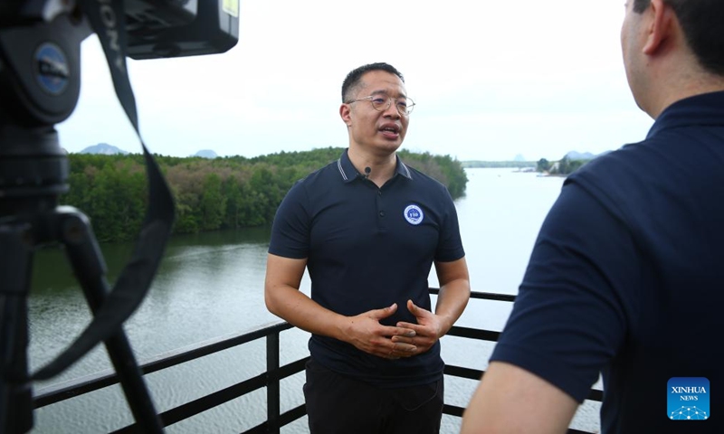 Cong Bolin, an associate researcher at the First Institute of Oceanography, the Ministry of Natural Resources of China, speaks during an interview with Xinhua at Ao Phang-Nga National Park in Phang Nga province, Thailand, Nov. 20, 2024. (Photo: Xinhua)