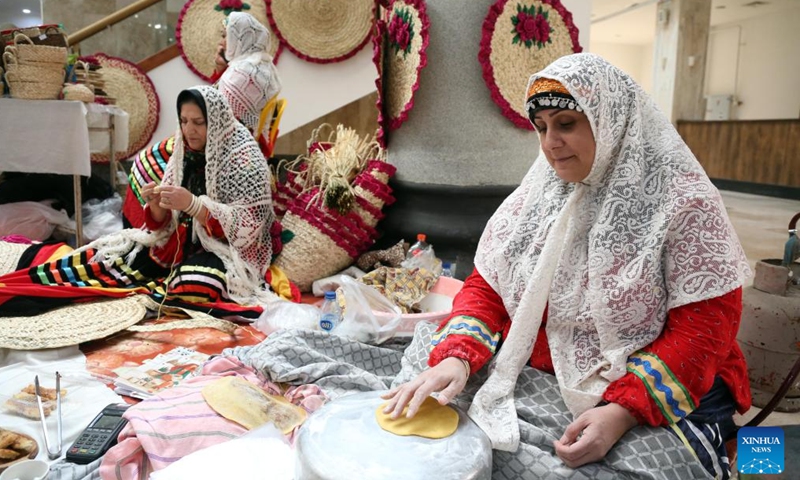 A woman makes local food in Rasht, Iran, Nov. 19, 2024. (Xinhua/Shadati)